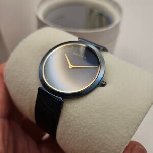 BERING - CLASSIC DARK BLUE STAINLESS WOMEN'S QUARTZ WATCH - 18132-399